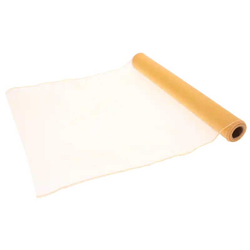 Rozwinięty kawałek pomarańczowej organzy na tle rolki. Materiał jest giętki i łatwy do formowania w kokardy lub draperie.