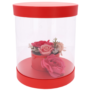 Czerwony flower box z przykładową kompozycją kwiatową wewnątrz. Przezroczyste ścianki eksponują rośliny, zapewniając jednocześnie dostęp powietrza.