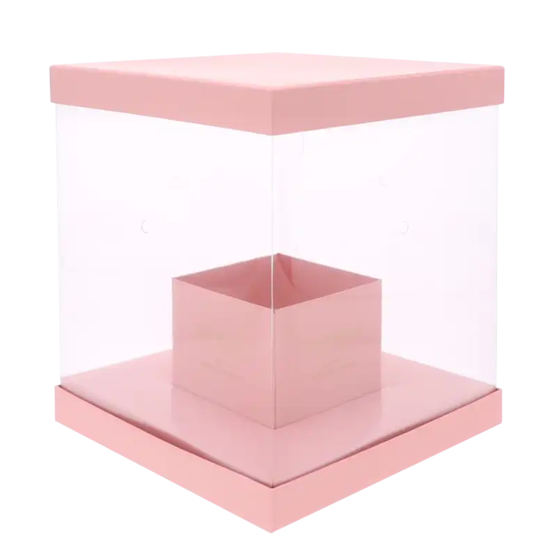 Pusty, złożony różowy flower box kwadratowy o wymiarach 25x25 cm z przezroczystymi bokami, gotowy do stworzenia własnej dekoracji.