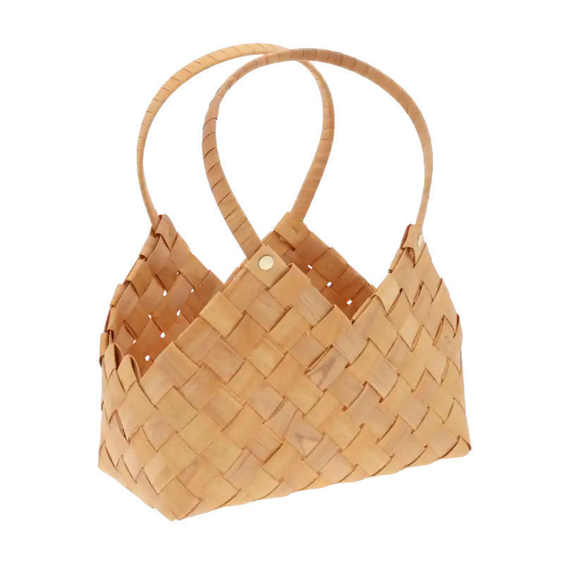 Pleciona torba dekoracyjna prezentowana pod kątem, ukazująca głębię oraz strukturę naturalnego materiału, idealna do aranżacji w stylu boho.