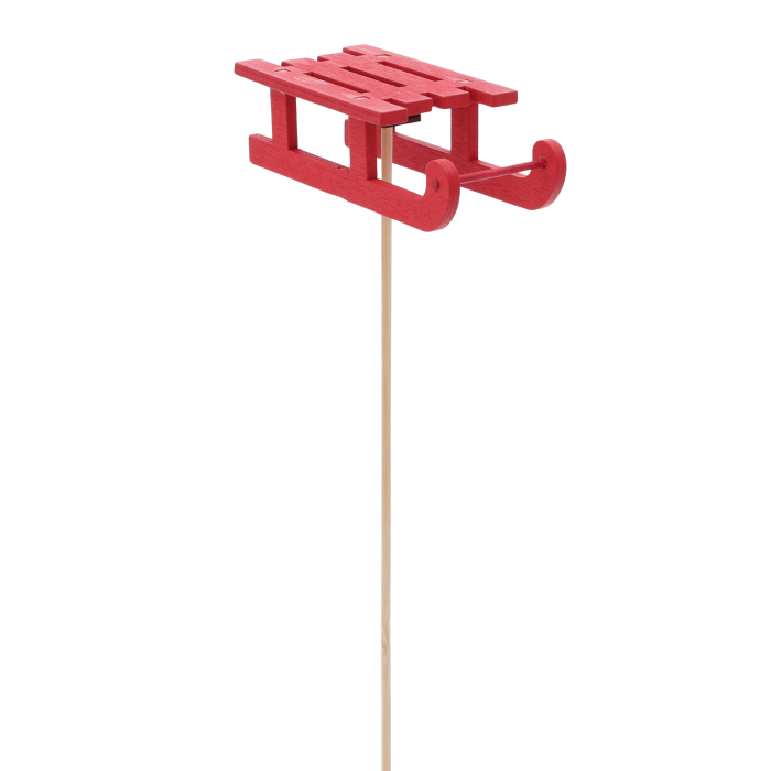 Czerwone sanki na piku o wysokości 22 cm. Drewniana dekoracja świąteczna na długim patyku, gotowa do umieszczenia w stroikach i bukietach.