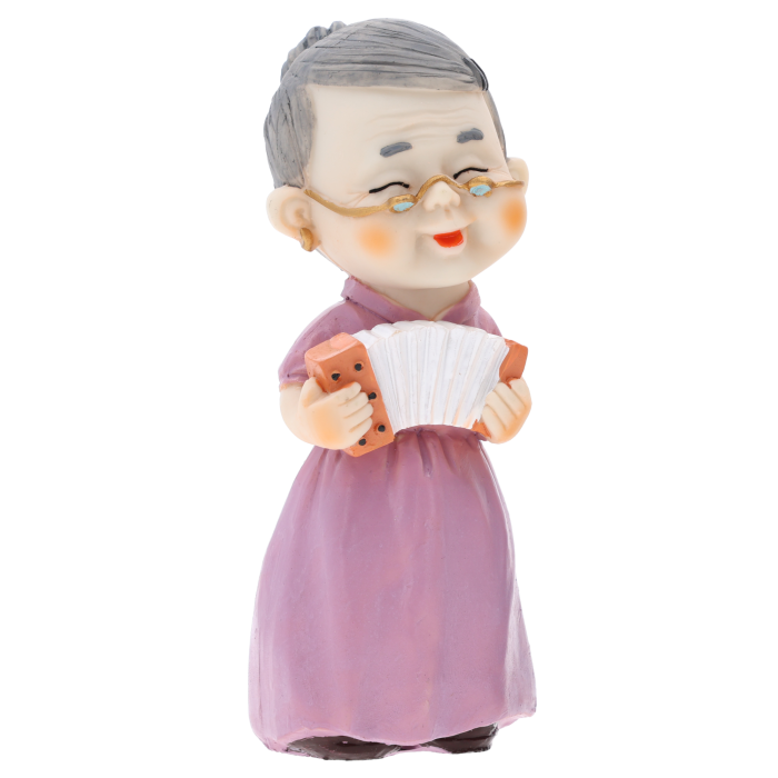 Figurka babcia z harmonią o wysokości 15 cm, wykonana z tworzywa. Przedstawia starszą panią w fioletowej sukni grającą na instrumencie.