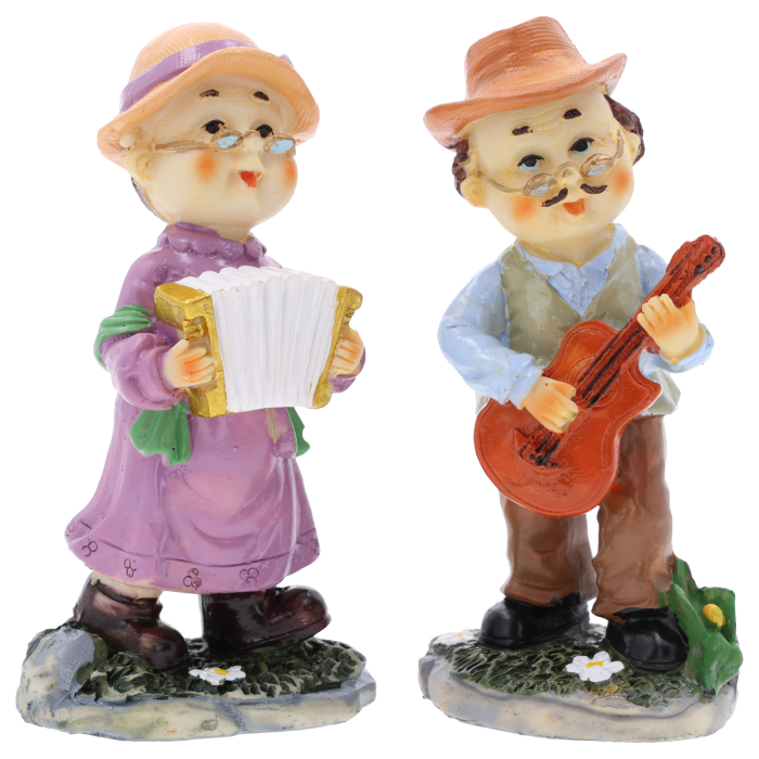 Komplet dwóch dekoracyjnych figurek przedstawiających babcię z akordeonem i dziadka z gitarą. Urocza ozdoba na prezent lub tort.