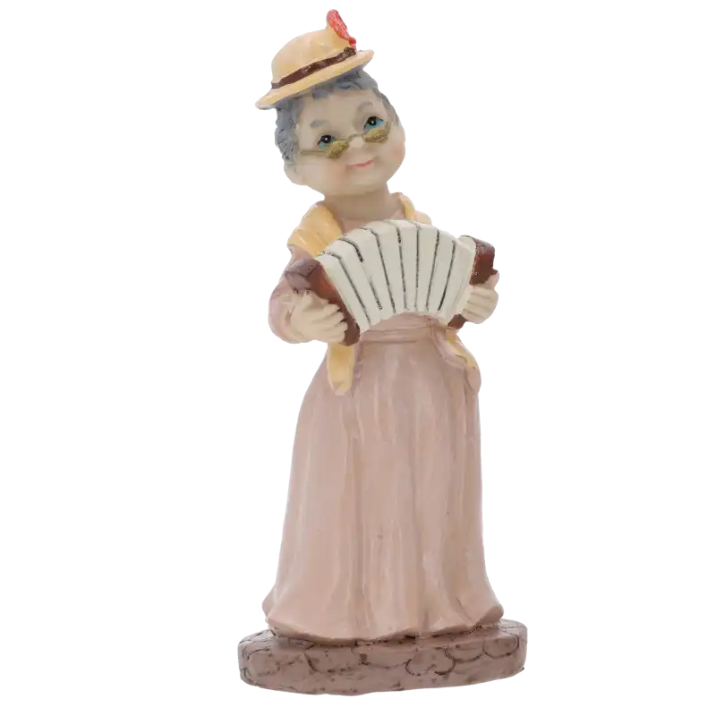 Dekoracyjna figurka babcia z harmonią o wysokości 17 cm wykonana z tworzywa. Sentymentalna ozdoba w kapeluszu i okularach.