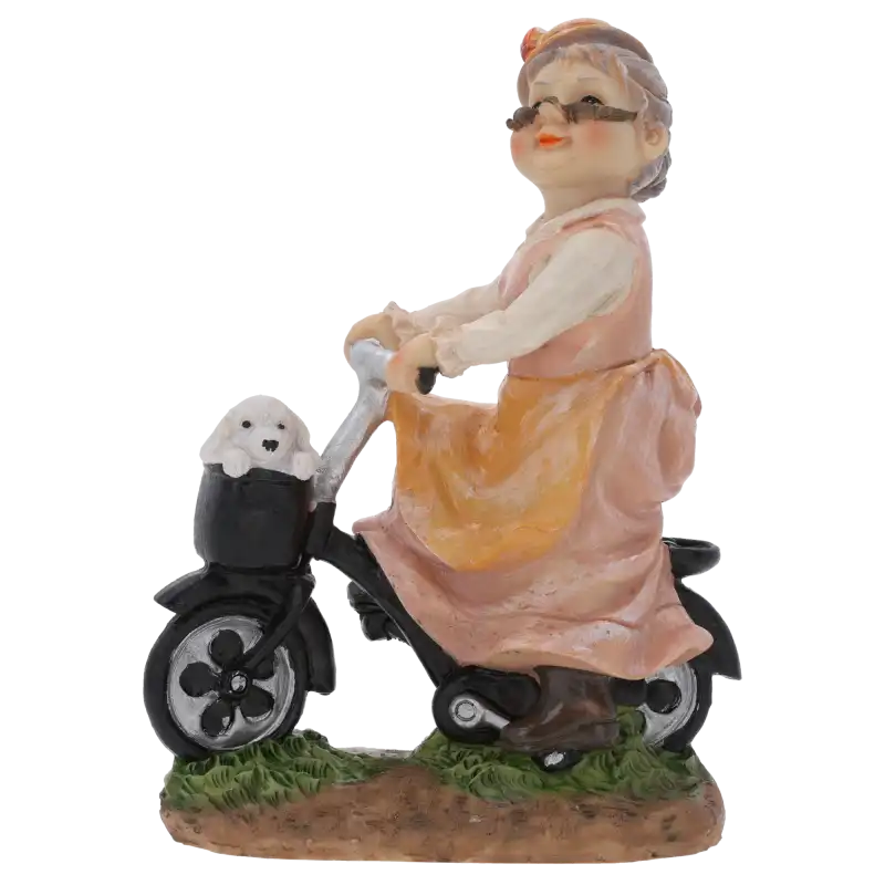 Figurka babcia na rowerze o wysokości 17 cm, wykonana z tworzywa, przedstawia postać z pieskiem w koszyku. Idealna jako dekoracja na prezent.