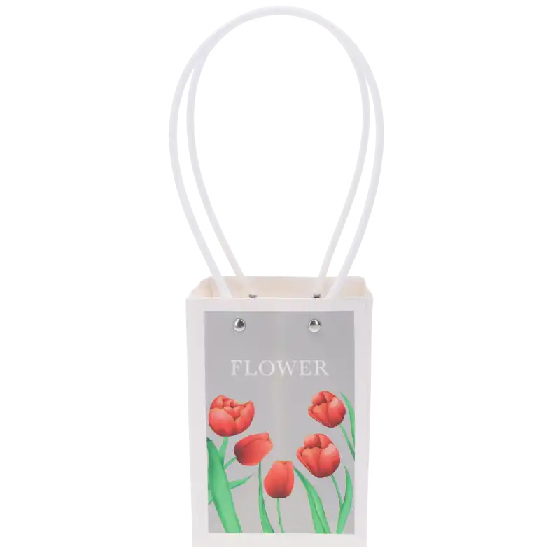 Pionowe ujęcie papierowej torebki kwiatowej o wymiarach 31x16x11 cm z nadrukiem tulipanów, wyposażonej w wygodne rączki.