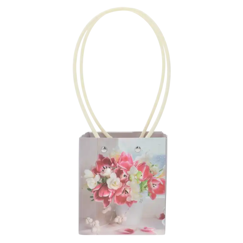 Pionowa papierowa torebka kwiatowa 31x13x11 cm z nadrukiem bukietu tulipanów. Posiada wygodne rączki do przenoszenia roślin.