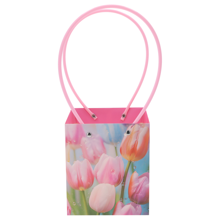 Pionowa torebka kwiatowa 34x15x13 cm z nadrukiem kolorowych tulipanów, wyposażona w różowe rączki ułatwiające przenoszenie kompozycji florystycznych.