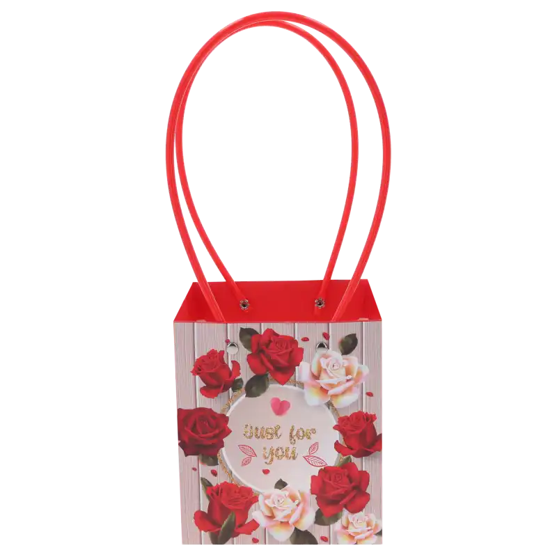 Papierowa torebka kwiatowa Just For You o wymiarach 34x16x11 cm z motywem róż i wygodnymi czerwonymi uchwytami, idealna do eleganckiego pakowania bukietów i roślin doniczkowych.