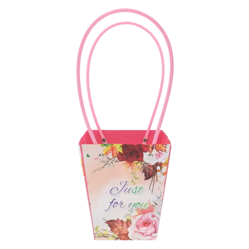 Papierowa torebka kwiatowa Just For You 34x15x12 cm z ozdobnym nadrukiem róż, prezentowana w całości z rączkami.