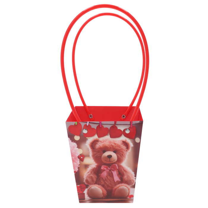 Papierowa torebka kwiatowa z nadrukiem misia o wymiarach 34x15x12 cm, wyposażona w czerwone uchwyty, przeznaczona na bukiety i rośliny doniczkowe.