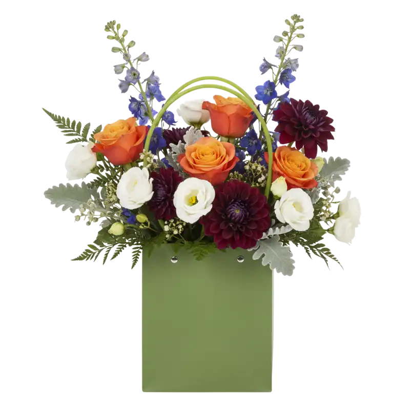 Zielona torebka kwiatowa 35x15x15 cm wypełniona kolorową kompozycją z różami i daliami, prezentująca funkcjonalność opakowania florystycznego.