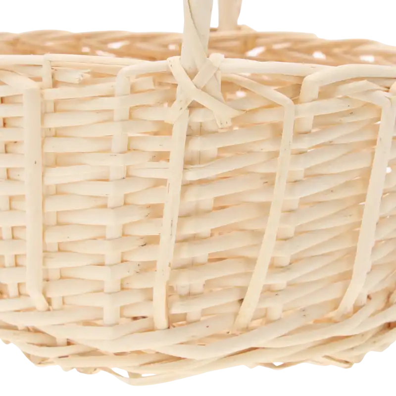 Zbliżenie na precyzyjny splot wikliny oraz mocowanie rączki w koszu o średnicy 22 cm, podkreślające jego formę.