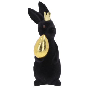 Pionowe ujęcie czarnego zająca welurowego ze złotym jajkiem. Widoczna tekstura miękkiego materiału oraz blask korony. Dekoracja wielkanocna o wysokości 20 cm na białym tle.