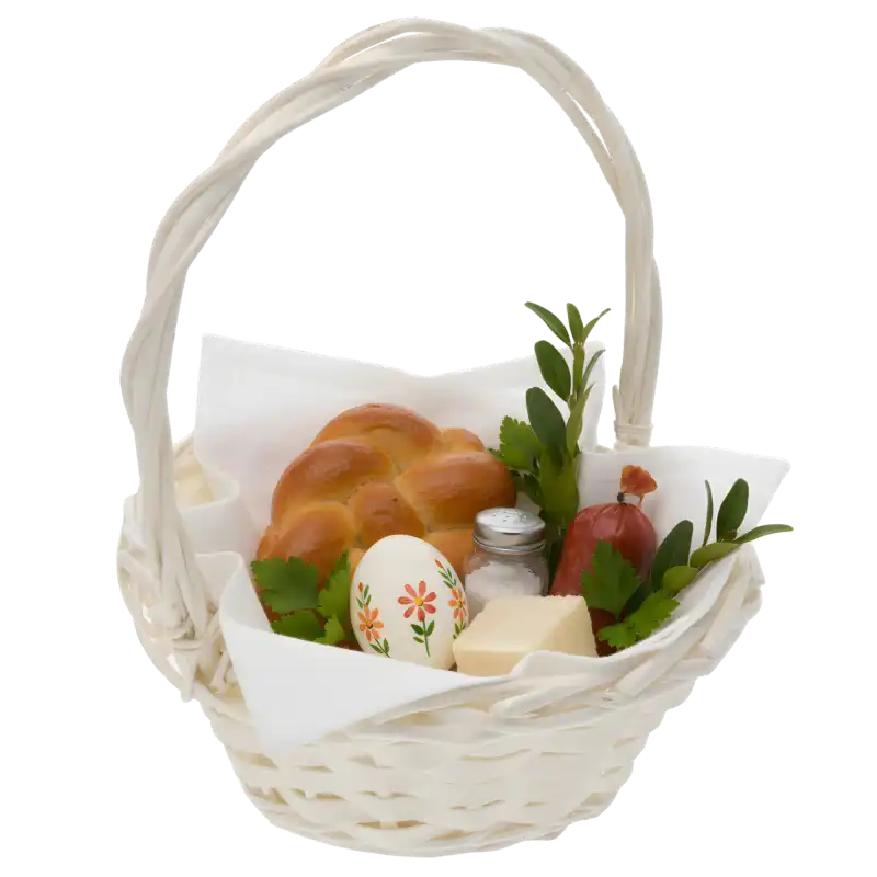Naturalny kosz wiklinowy wypełniony świątecznymi produktami, gotowy jako elegancki zestaw prezentowy na Wielkanoc.