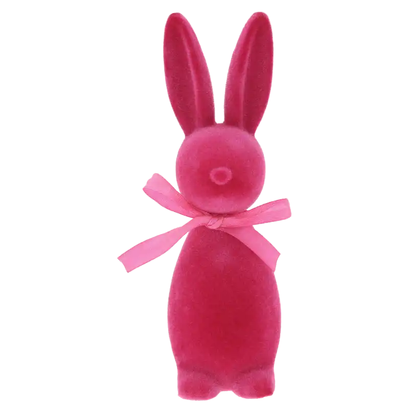 Różowy welurowy zając 18 cm to nowoczesna dekoracja wielkanocna z satynową kokardą, idealna do wiosennych aranżacji i kompozycji florystycznych.