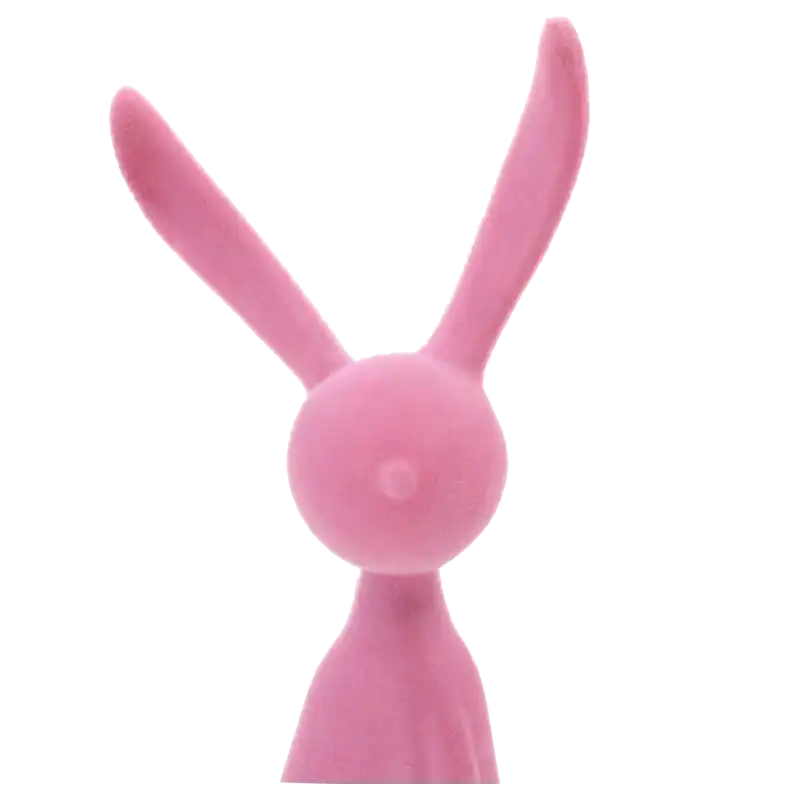 Zbliżenie na górną część figurki zająca, prezentujące długie, pionowe uszy oraz gładką głowę w pastelowym odcieniu różu.