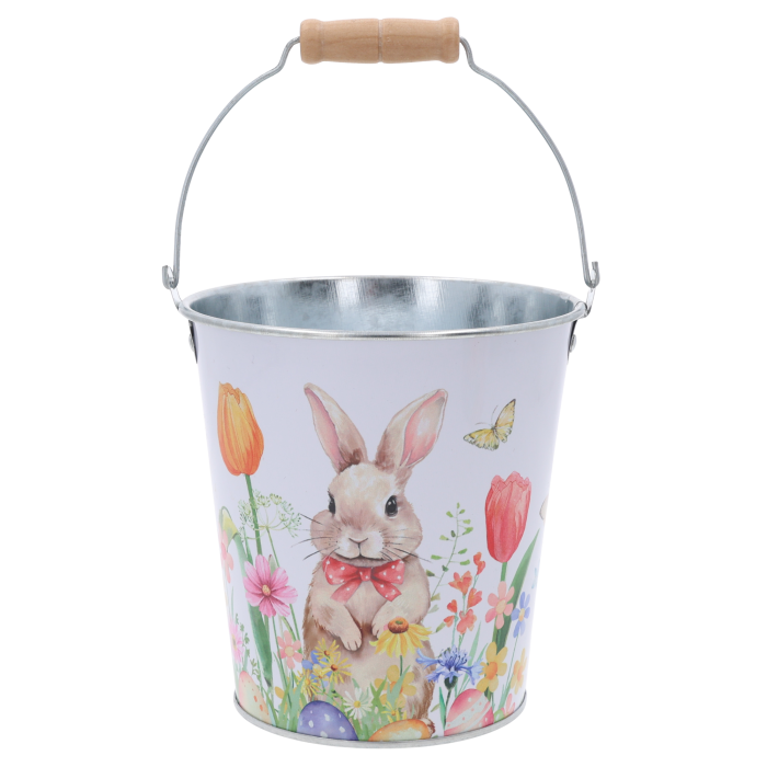 Wiosenna metalowa osłonka w formie wiaderka o średnicy 13 cm. Posiada kolorowy nadruk zająca, kwiatów i drewnianą rączkę.
