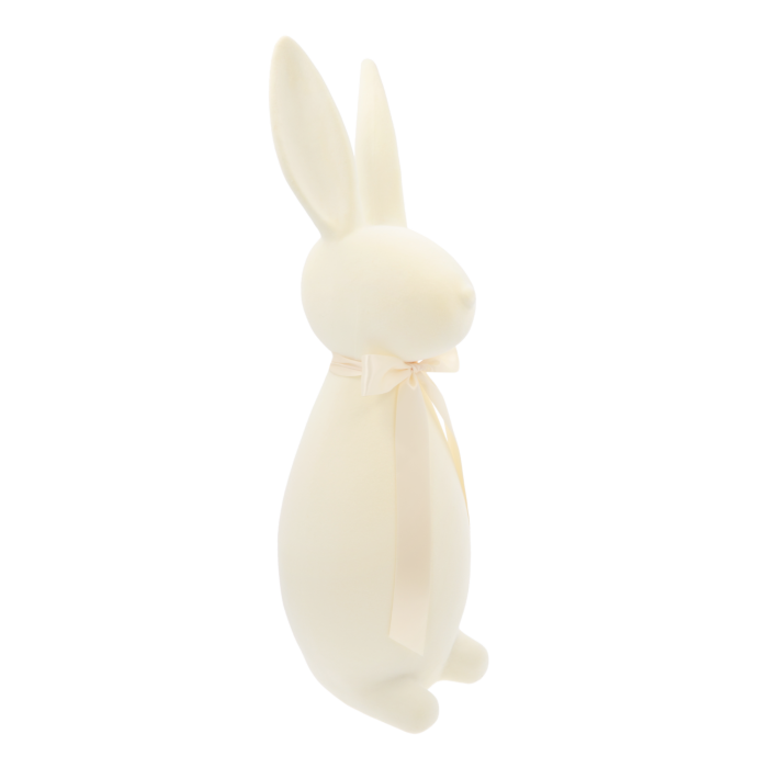 Kremowy welurowy zając 40 cm w profilu. Elegancka wielkanocna dekoracja o minimalistycznej formie z satynową kokardą.
