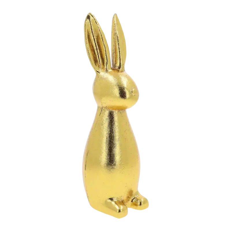 Złoty zając o wysokości 30 cm w postarzanym wykończeniu glamour. Figurka stanowi elegancką ozdobę wnętrz, doskonałą do salonu lub sypialni jako świąteczny akcent.