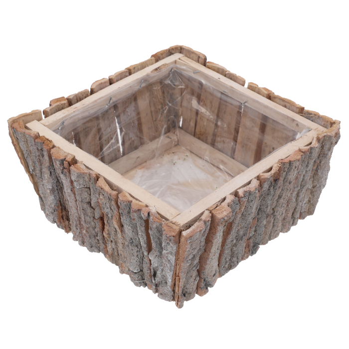 Kwadratowa osłonka z kory 25x25 cm o surowej fakturze, wyposażona w wewnętrzną folię ochronną do bezpiecznego sadzenia roślin.