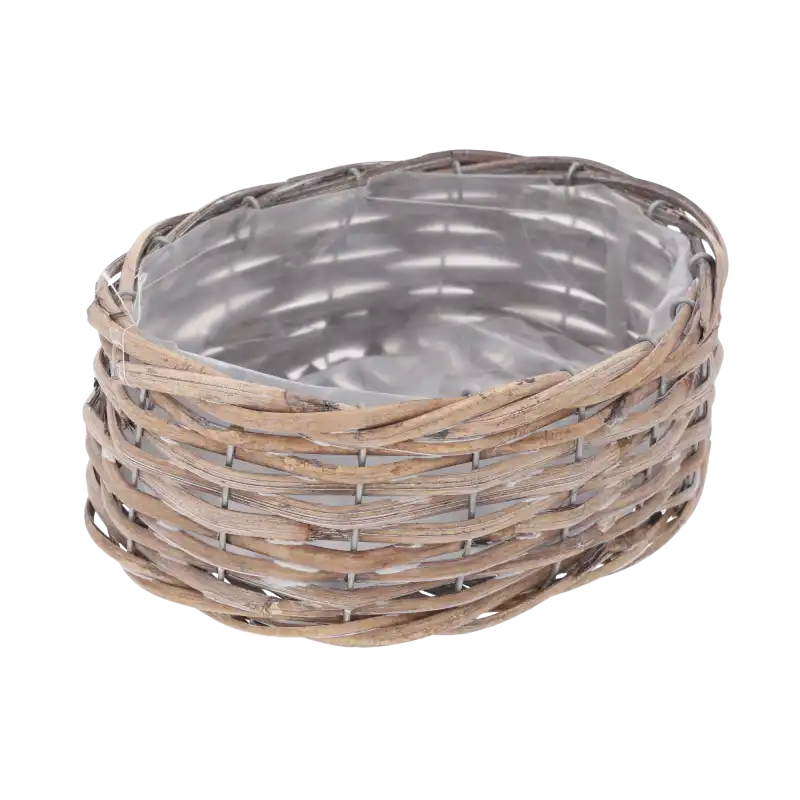 Owalna osłonka wiklinowa 23x16 cm o naturalnym splocie, wyposażona w praktyczną folię ochronną wewnątrz, idealna jako baza do małych kompozycji florystycznych.