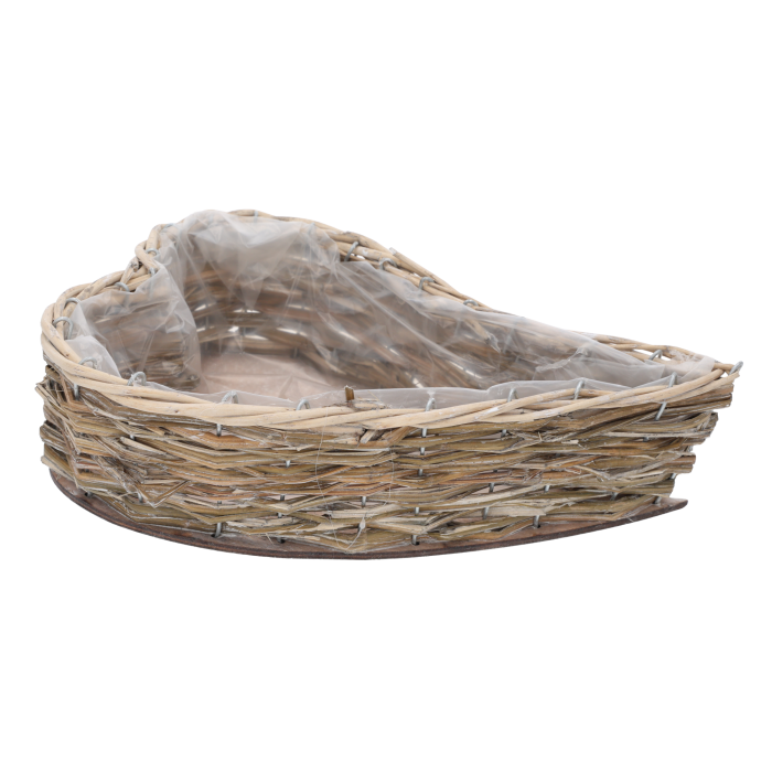 Kompaktowa osłonka z wikliny w formie serca o wielkości 32x23 cm, wyłożona przezroczystą folią zabezpieczającą przed wilgocią podczas sadzenia.