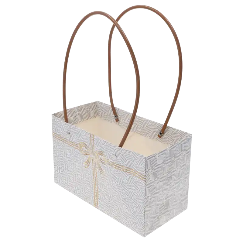 Widok na wnętrze papierowej torebki kwiatowej o wymiarach 32x22x10 cm z widocznymi brązowymi rączkami pod kątem.