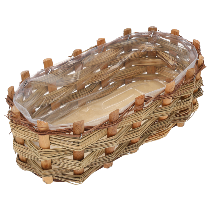 Owalna osłonka z kory 33x17 cm pokazująca wnętrze wyłożone folią ochronną. Ujęcie z góry ukazujące kształt naczynia.