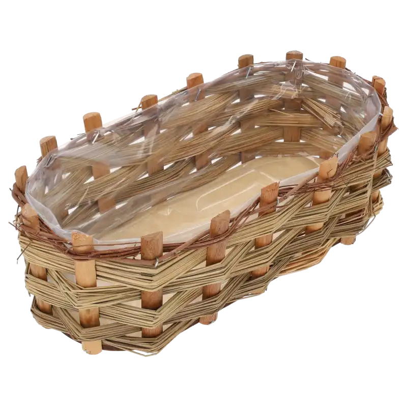 Owalna osłonka z kory 33x17 cm pokazująca wnętrze wyłożone folią ochronną. Ujęcie z góry ukazujące kształt naczynia.