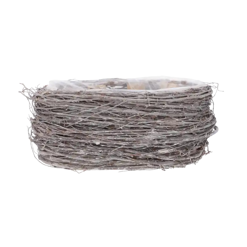 Owalny pojemnik na rośliny spleciony z naturalnych gałązek. Prosta forma pasująca do rustykalnych aranżacji florystycznych.
