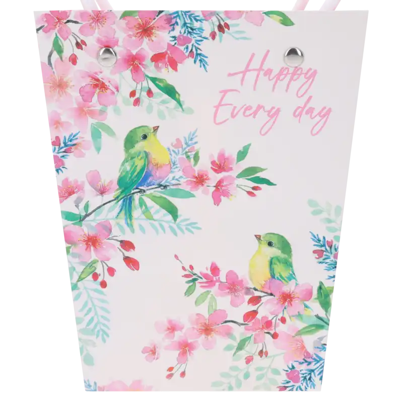 Zbliżenie na szczegółowy nadruk z ptakami i kwiatami wiśni na papierowej torebce dekoracyjnej z napisem Happy Every Day.