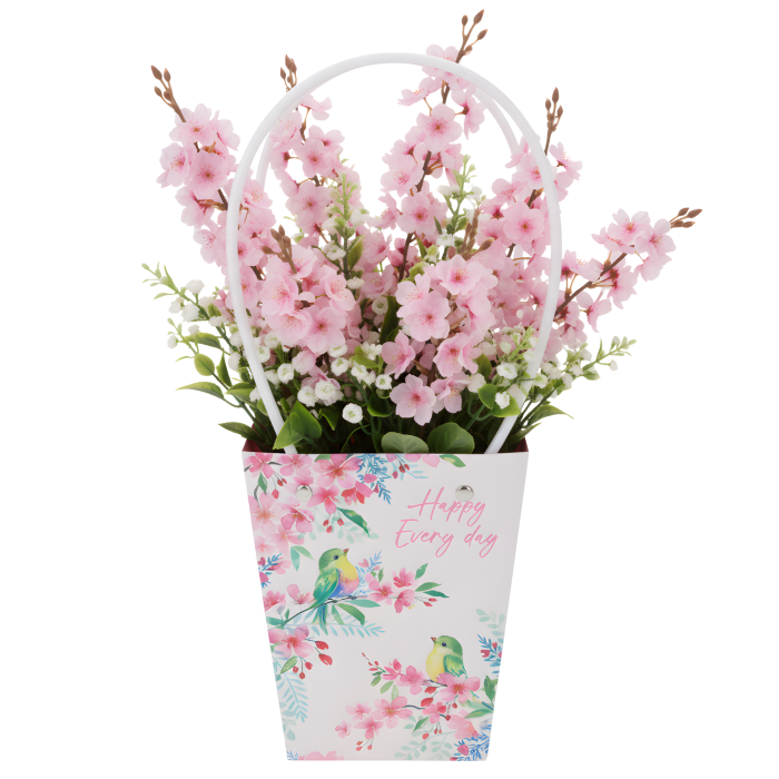 Torebka kwiatowa Happy Every Day z umieszczoną wewnątrz kompozycją różowych sztucznych kwiatów, prezentująca sposób wykorzystania opakowania.