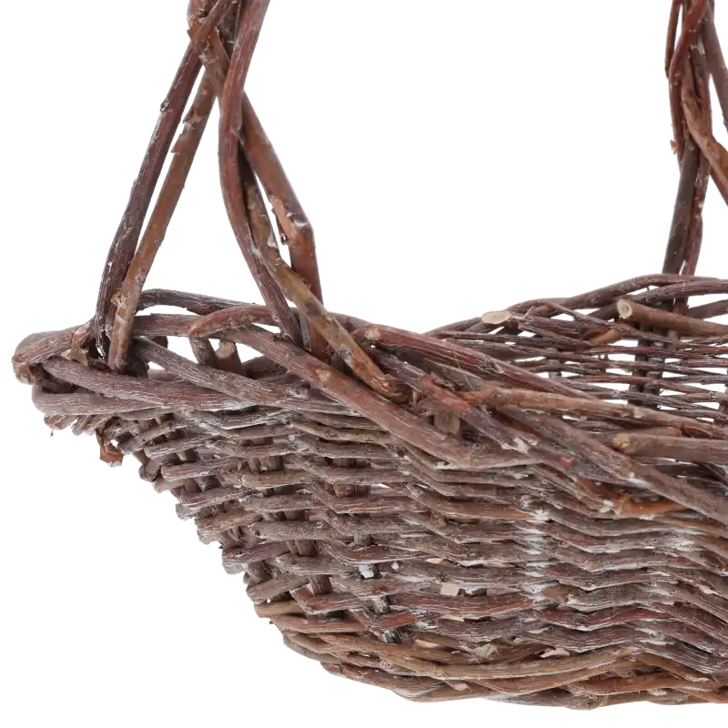 Detale splotu wiklinowego na krawędzi kosza, podkreślające naturalne surowce i ręczne wykonanie dekoracji.