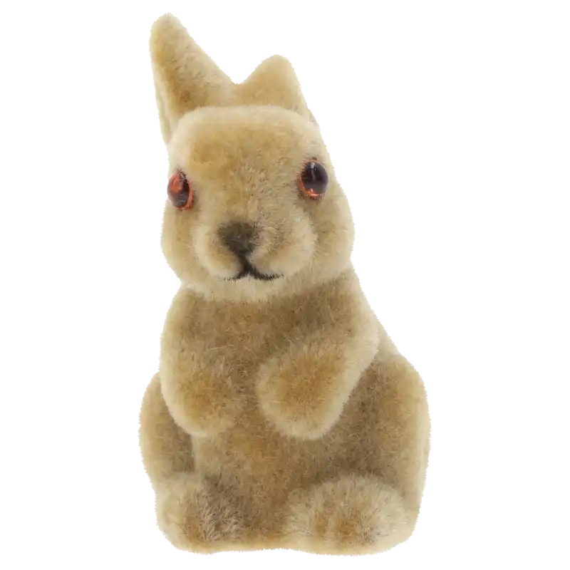 Brązowy flokowany zajączek wielkanocny o wysokości 8 cm. Figurka z miękkim zamszowym włosiem w naturalnym odcieniu.