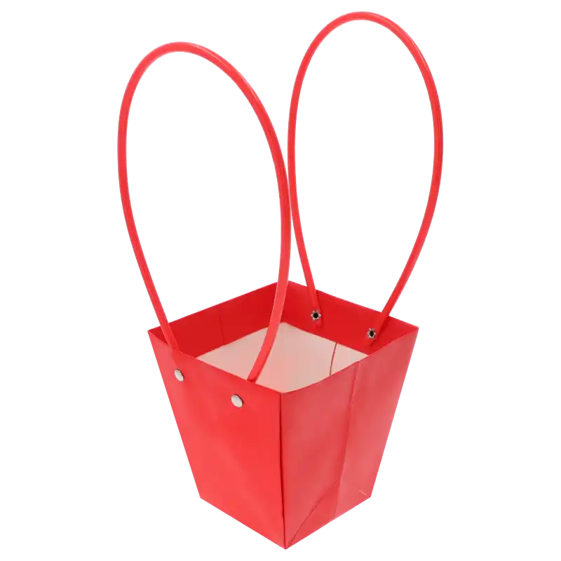 Wnętrze czerwonej torebki kwiatowej o wysokości 32 cm z widocznymi uchwytami. Konstrukcja z papieru i tworzywa do roślin.