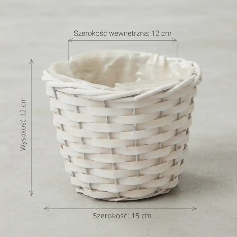 Prezentacja wymiarów białej osłonki rattanowej: szerokość 15 cm, wysokość 12 cm, szerokość wewnętrzna 12 cm.
