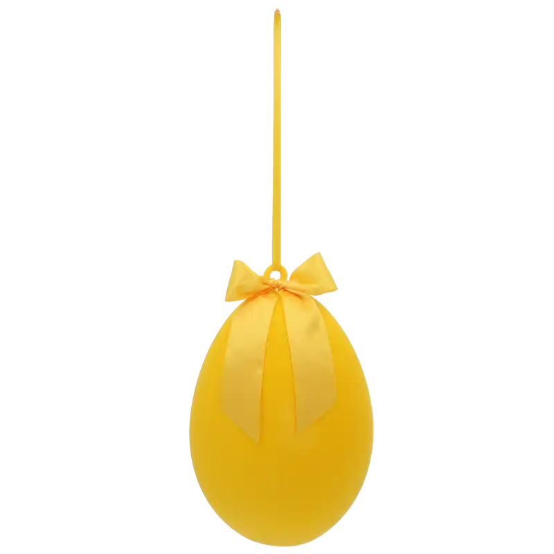 Żółte welurowe jajo wielkanocne wiszące na wstążce od Trend Deco.