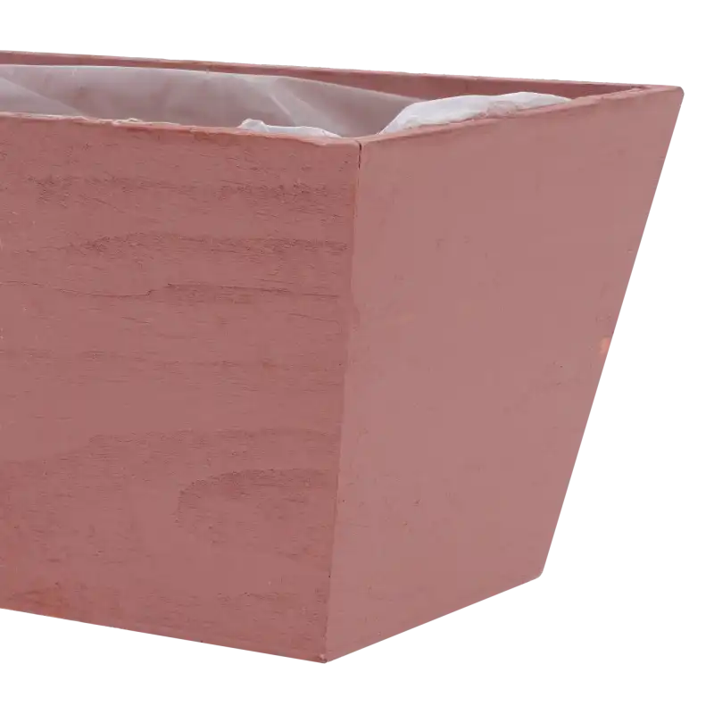 Zbliżenie na narożnik i widoczną strukturę drewna różowej drewnianej skrzynki na kwiaty 20x12x10 cm